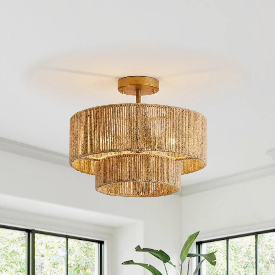 Overhead view of Solmaz mid-century modern pendant lamp showing dual-tier rattan construction and brass metal mount in bright interior