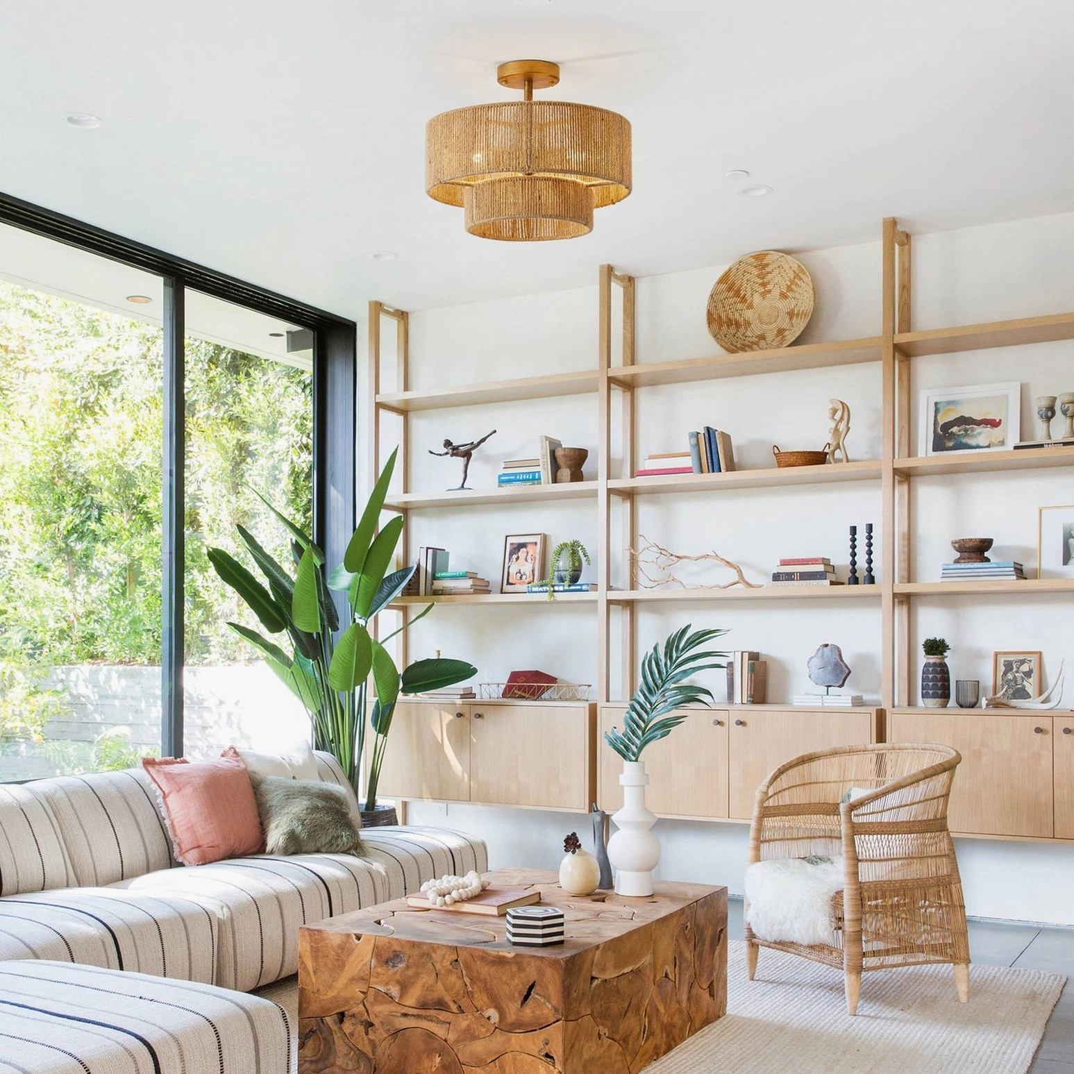 Wide room view of Solmaz ceiling lamp in cozy living room with boho coastal rustic interior design