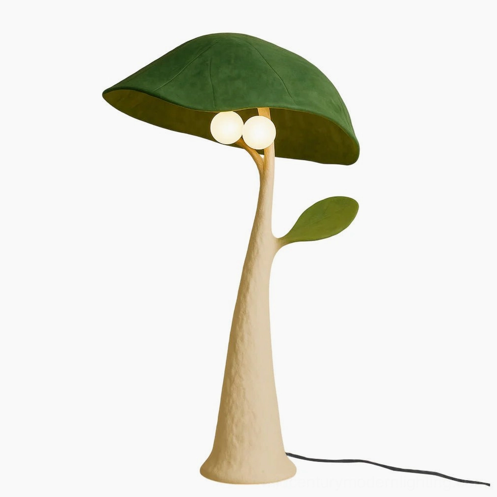 Soloma mushroom floor lamp with cream textured metal trunk and green suede shade, three-quarter front view showcasing dual globe bulbs and biomorphic sculptural form