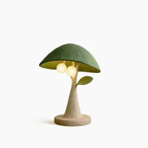Soloma botanical resin table lamp with matte green canopy and off-white textured trunk, shown in studio side-view against white background