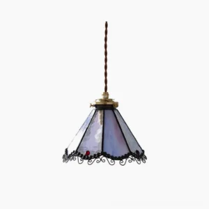 Sonoma Tiffany stained glass pendant lamp with purple and blue gradient glass panels and ornate black trim, front view studio shot