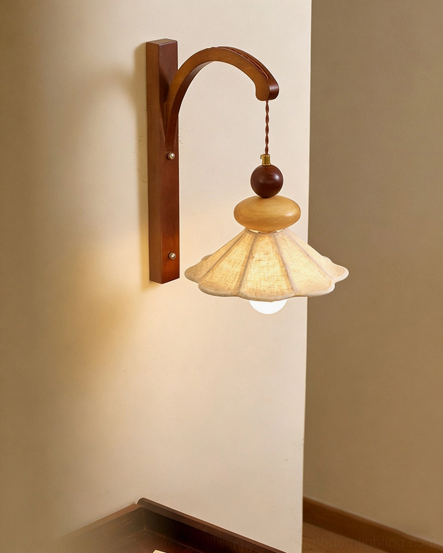Soren fabric sconce with flared pleated linen shade in minimalist corner interior scene