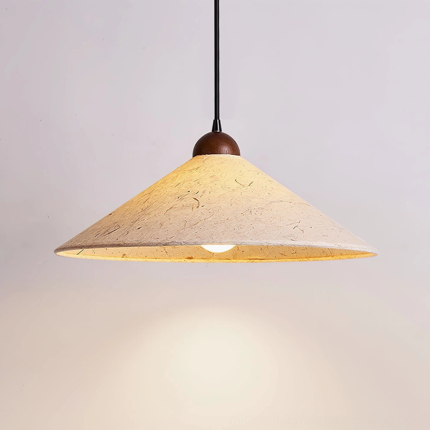 Soren Swing Arm Pendant Light in bedroom reading zone, warm LED illumination over nightstand and armchair