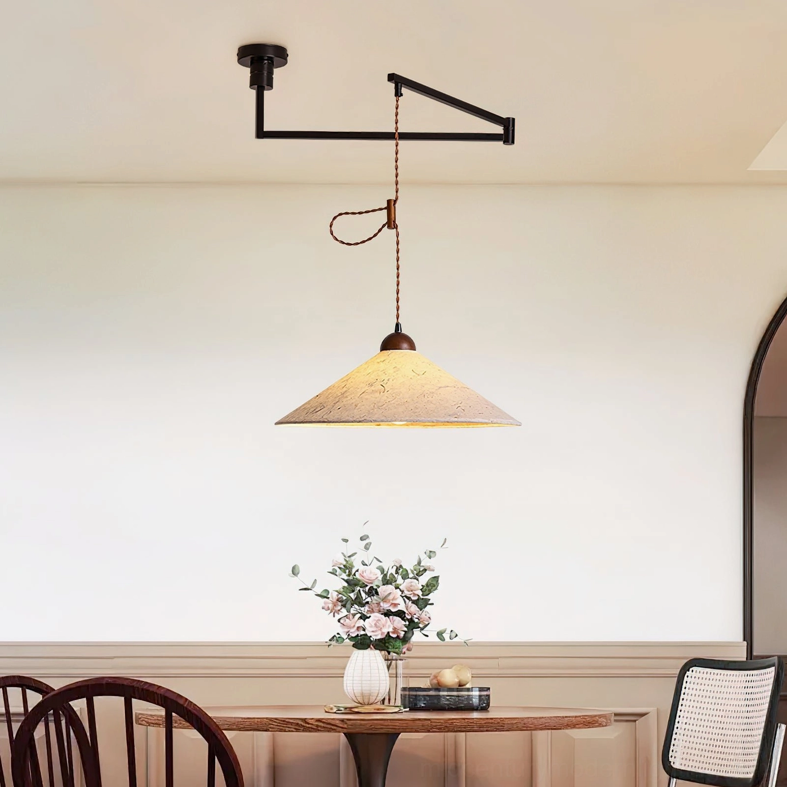 Soren Swing Arm Pendant Light in casual dining nook, eye-level view showcasing rustic warm neutral aesthetic and directional illumination