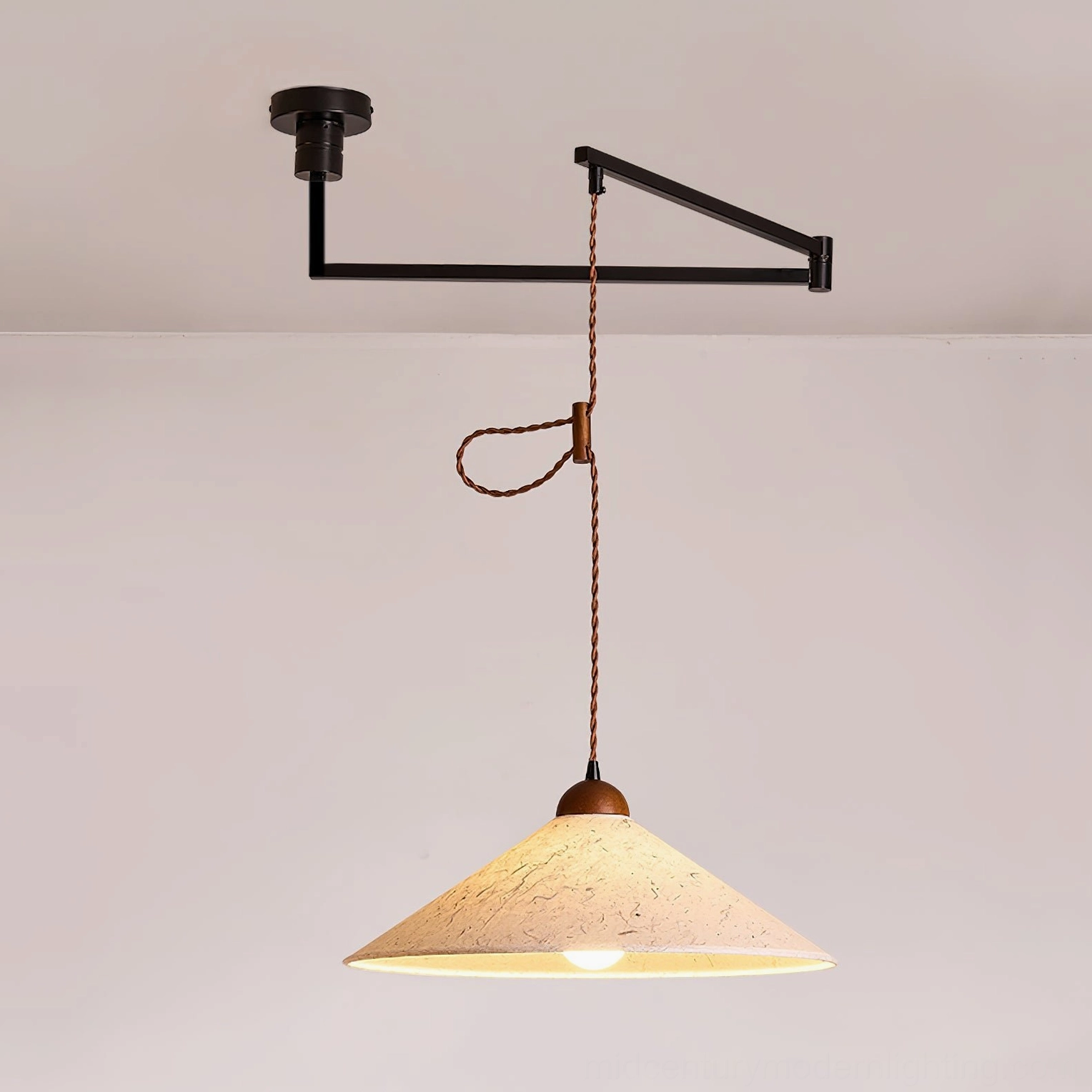 Soren Swing Arm Pendant Light with Edison bulb filament glow, vintage ambiance and artisanal character demonstration