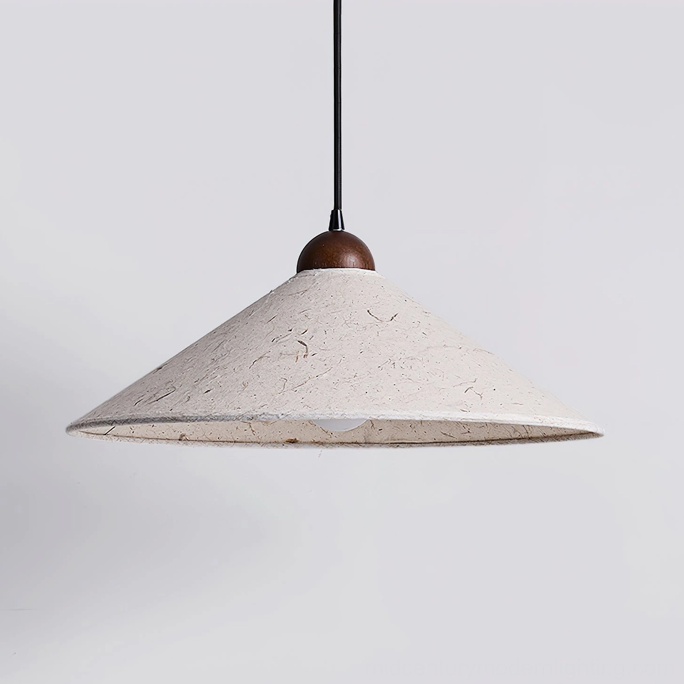 Soren Swing Arm Pendant Light in home studio workspace, task lighting positioned over creative desk area