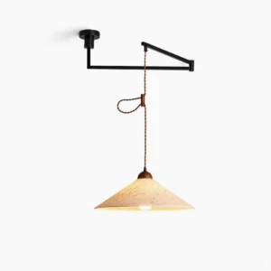 Soren Swing Arm Pendant Light side profile, minimalist black metal arm with handwoven beige conical shade, studio backdrop