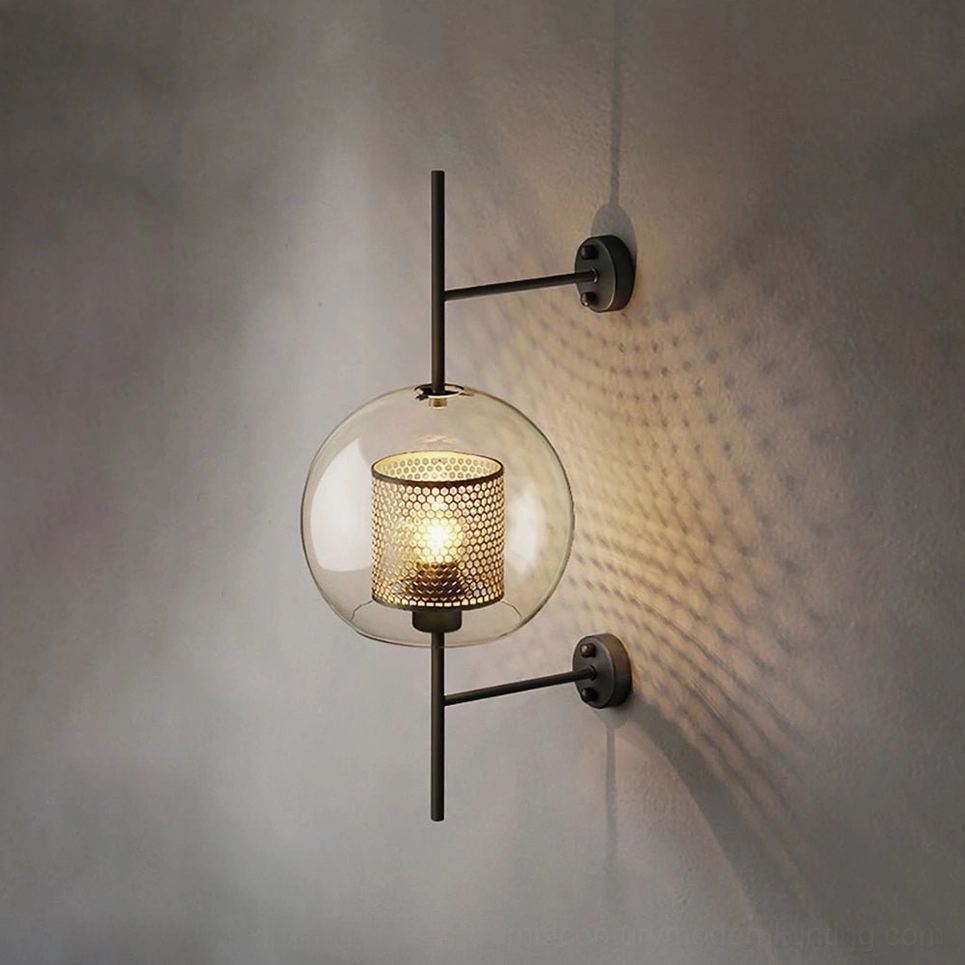 Modern glass sconce showing sphere shape and warm color temperature option