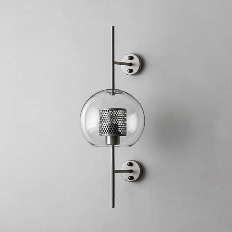 Modern glass sconce with sphere silhouette and minimalist metal frame design