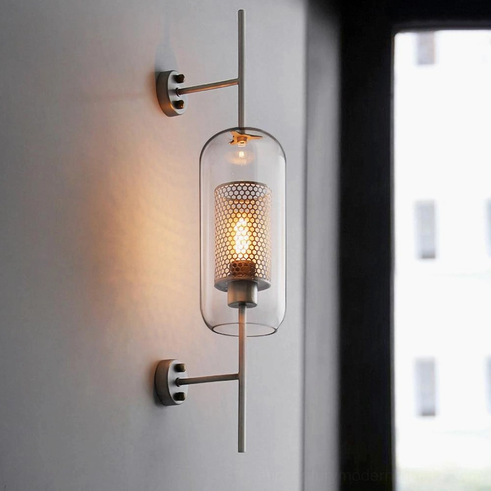 Contemporary glass wall lamp with spherical shape and warm ambient lighting