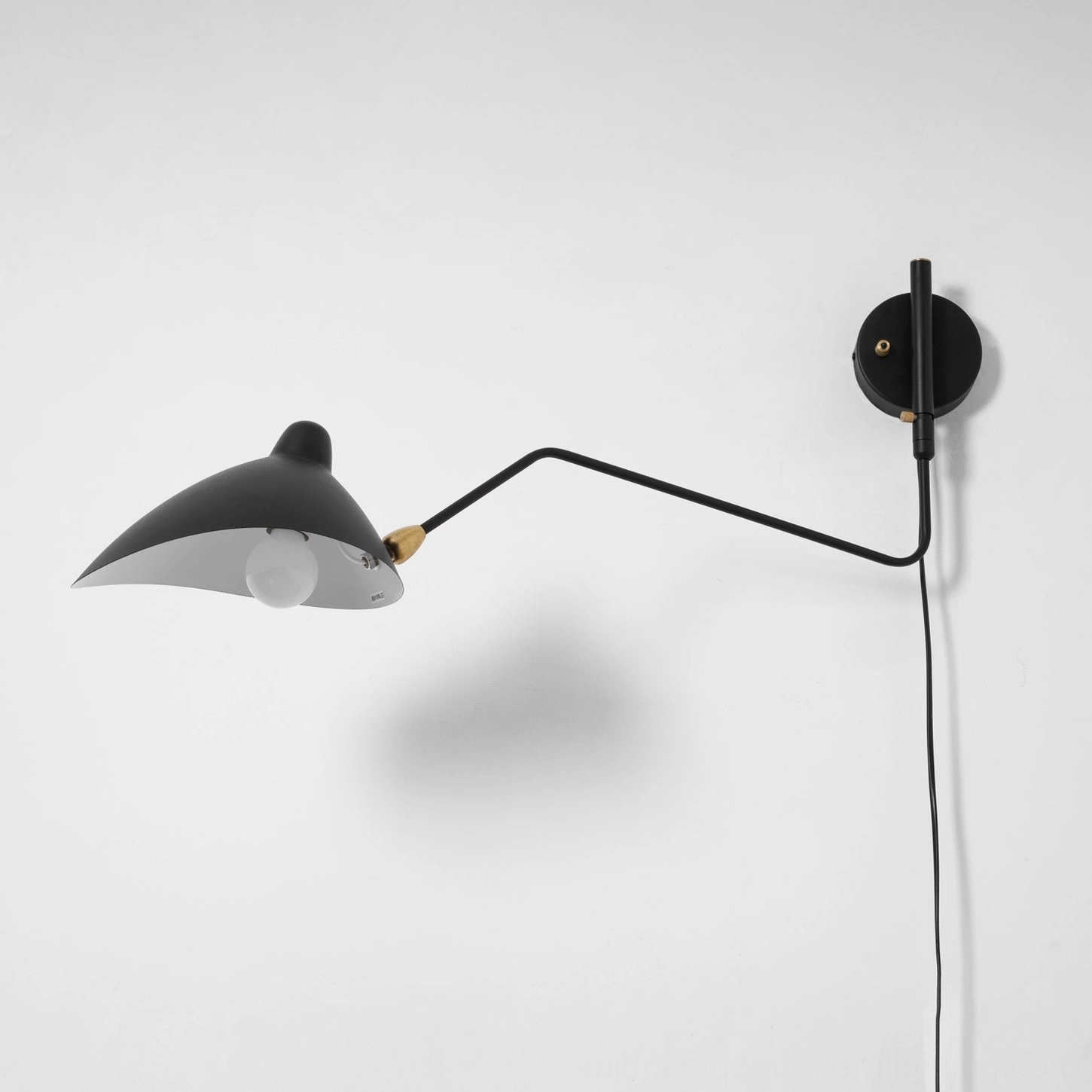 Articulated spider wall lamp showing cord length and switch plug configuration