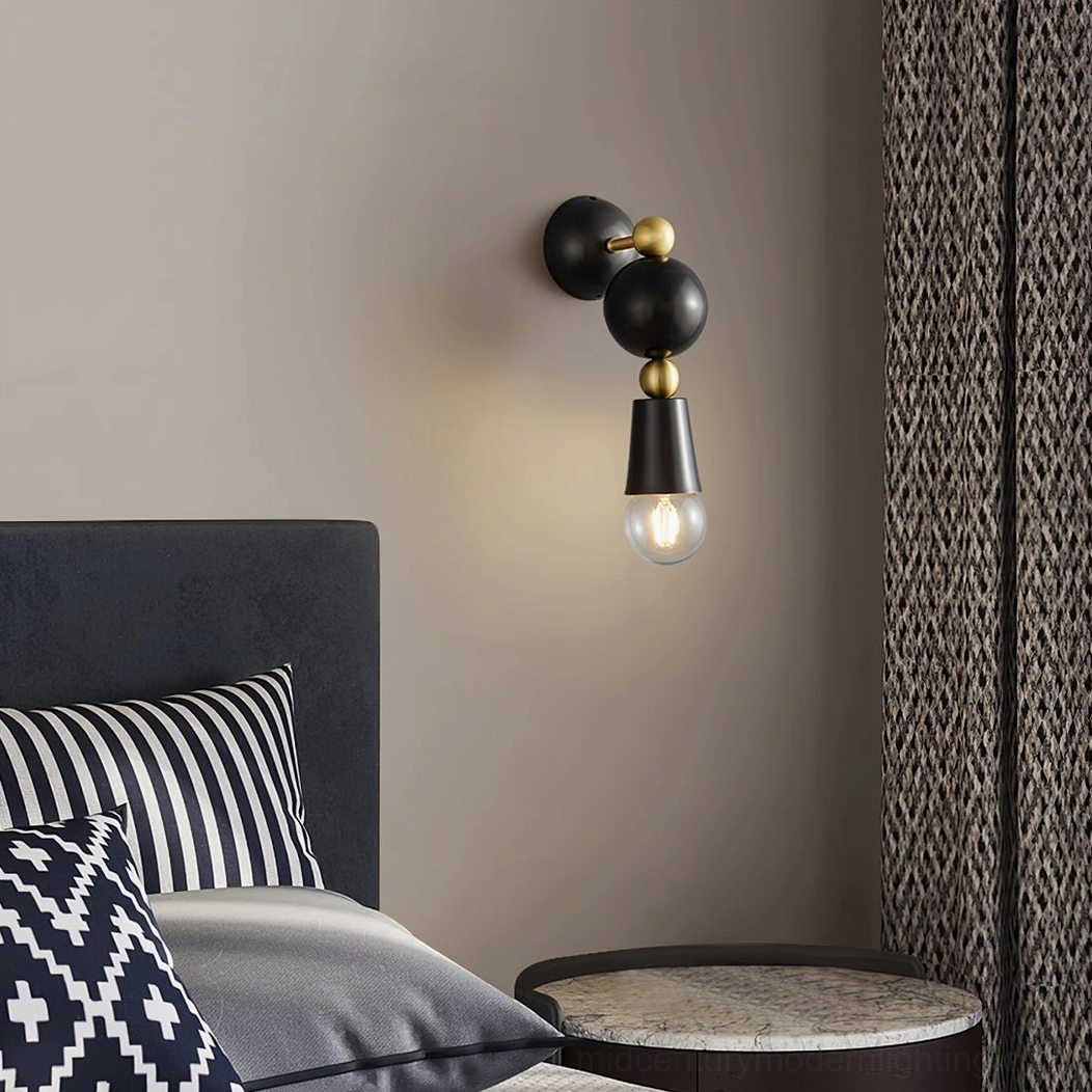 Modern bedroom with Spindle wall sconces providing bedside ambient lighting