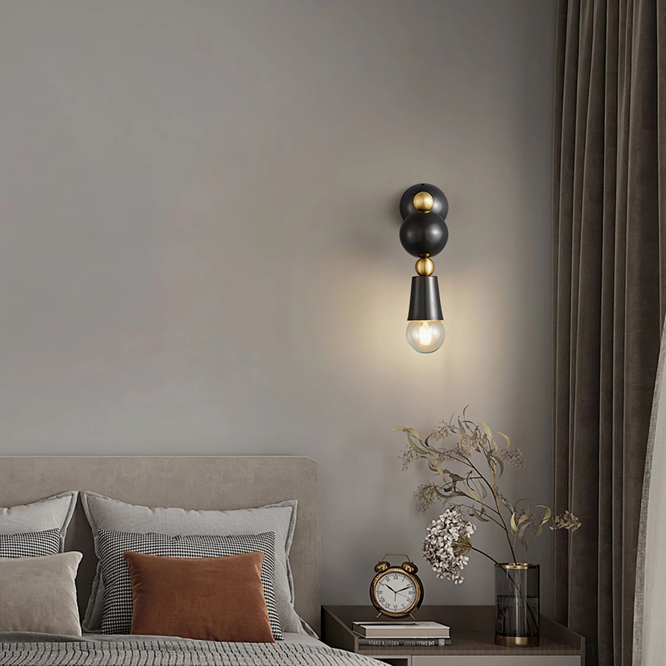 Spindle wall sconce with exposed vintage Edison bulb creating warm ambient glow