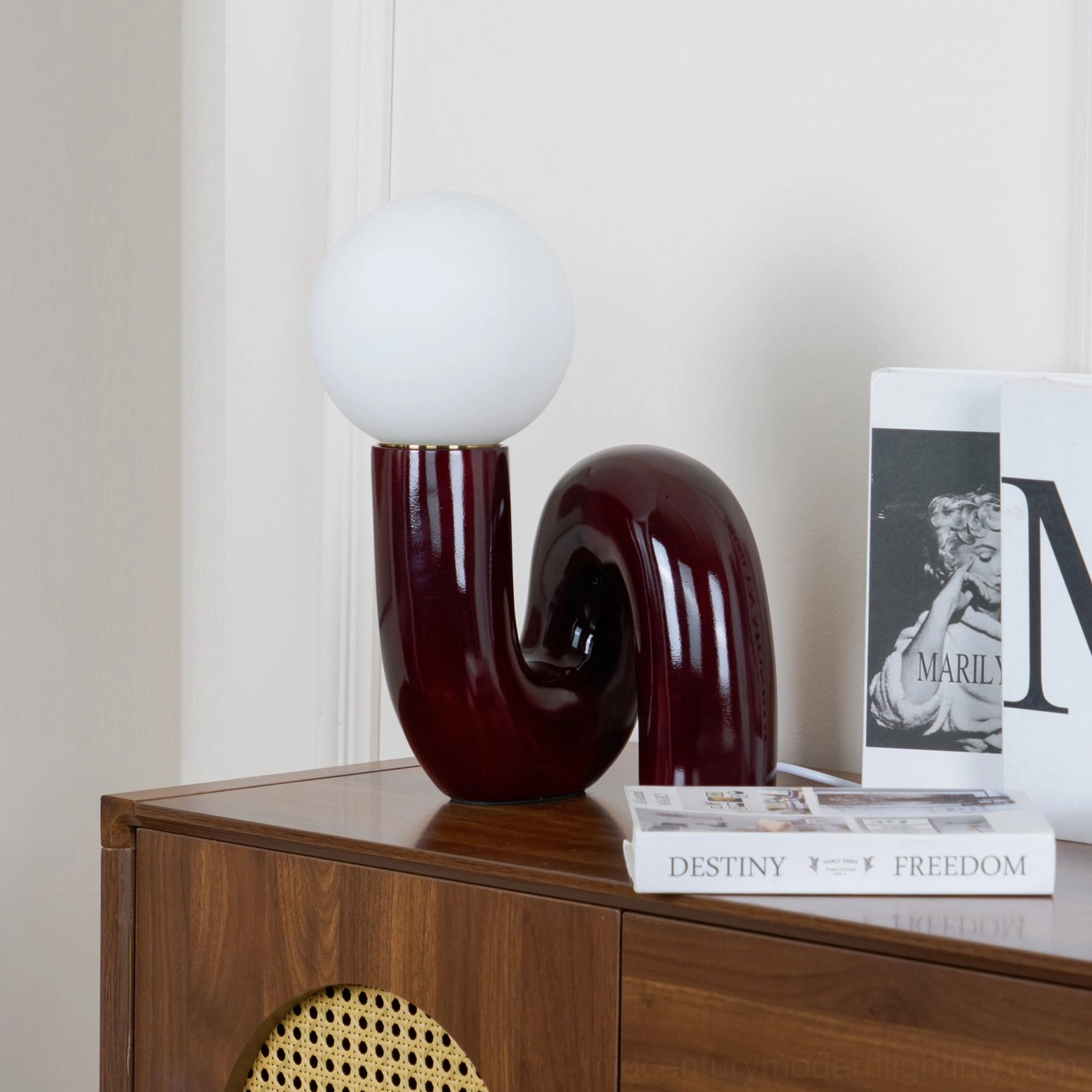 Spiral Glass Table Lamp with frosted glass lamp shade unlit, photographed against wooden side cabinet