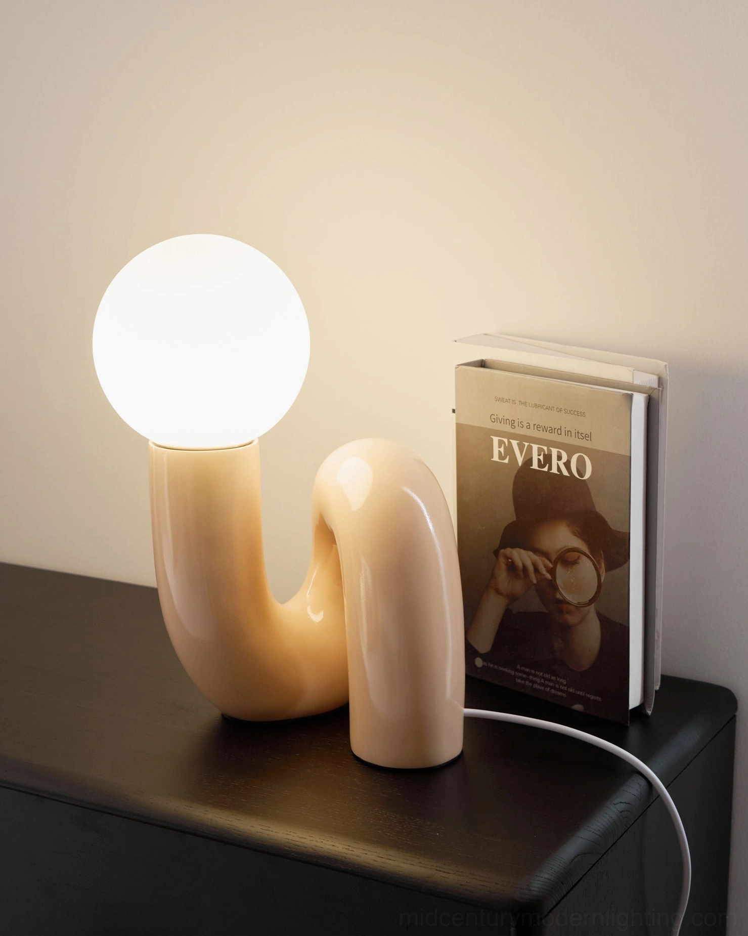 Spiral Table Lamp as sculptural conversation piece for design collectors and contemporary art enthusiasts
