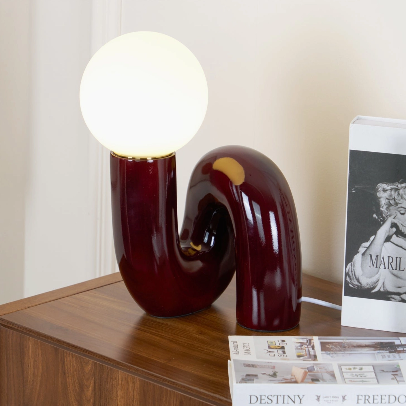 Contemporary Spiral Table Lamp three-quarter view showing curved tubular ceramic base and glass spiral form