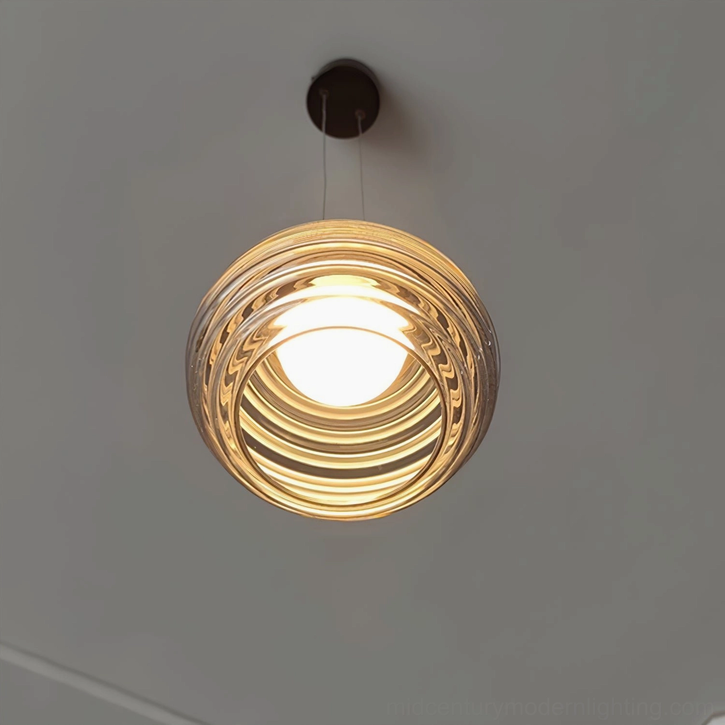 Splugen smoke glass pendant fixture with clean minimalist design aesthetic and contemporary styling