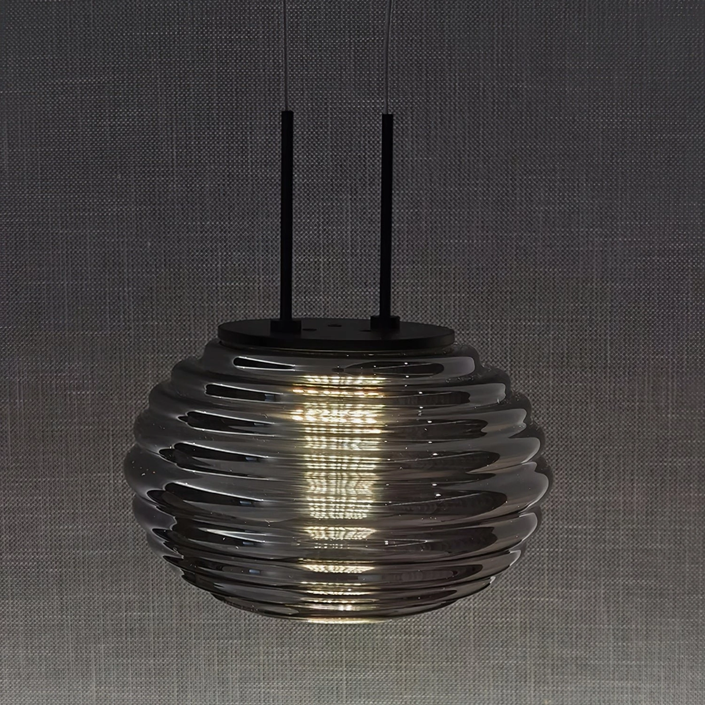 Splugen pendant lamp cluster arrangement demonstrating multiple unit configuration above dining surface