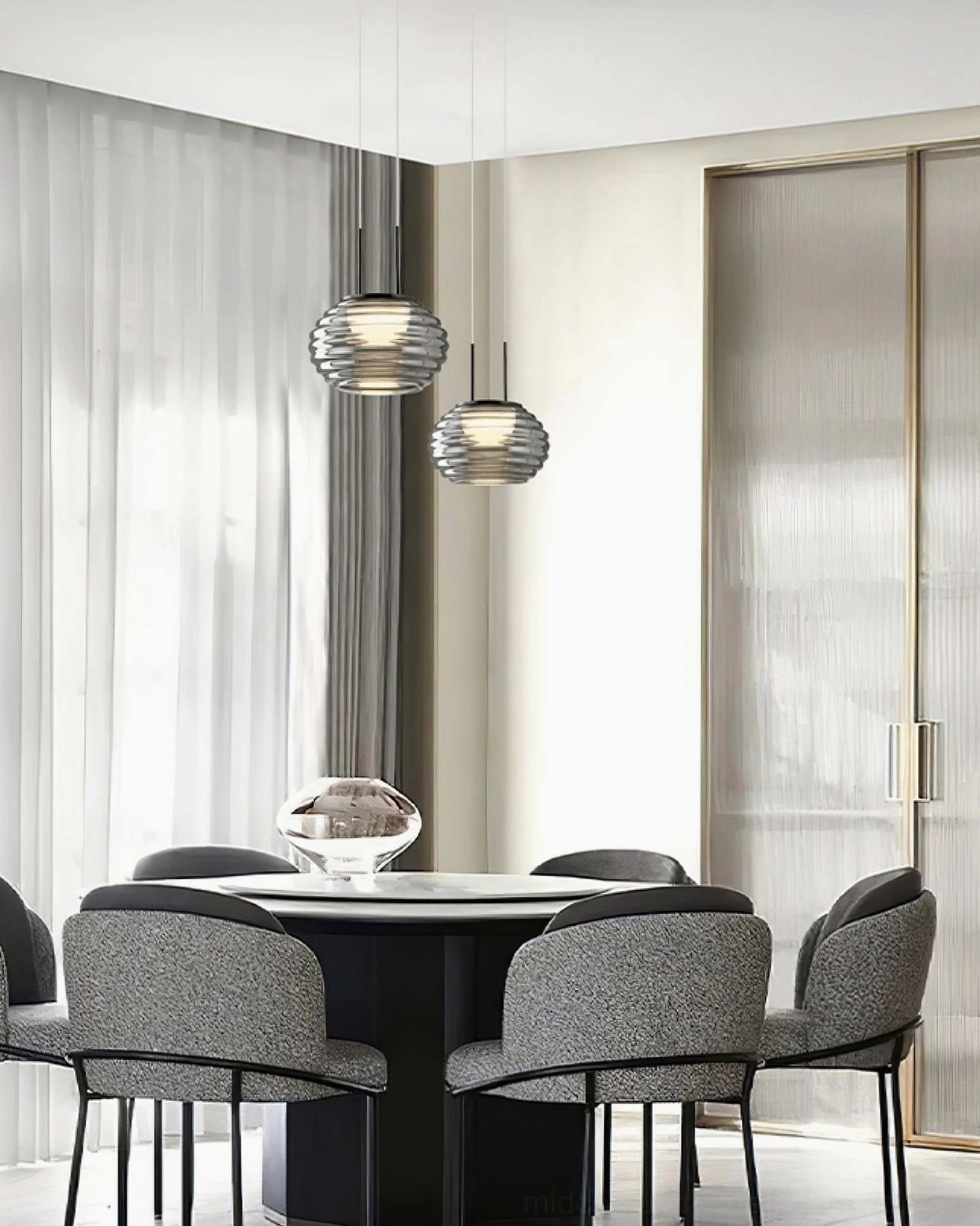 Splugen Venetian glass pendant light suspended in refined modern interior with curated ambiance