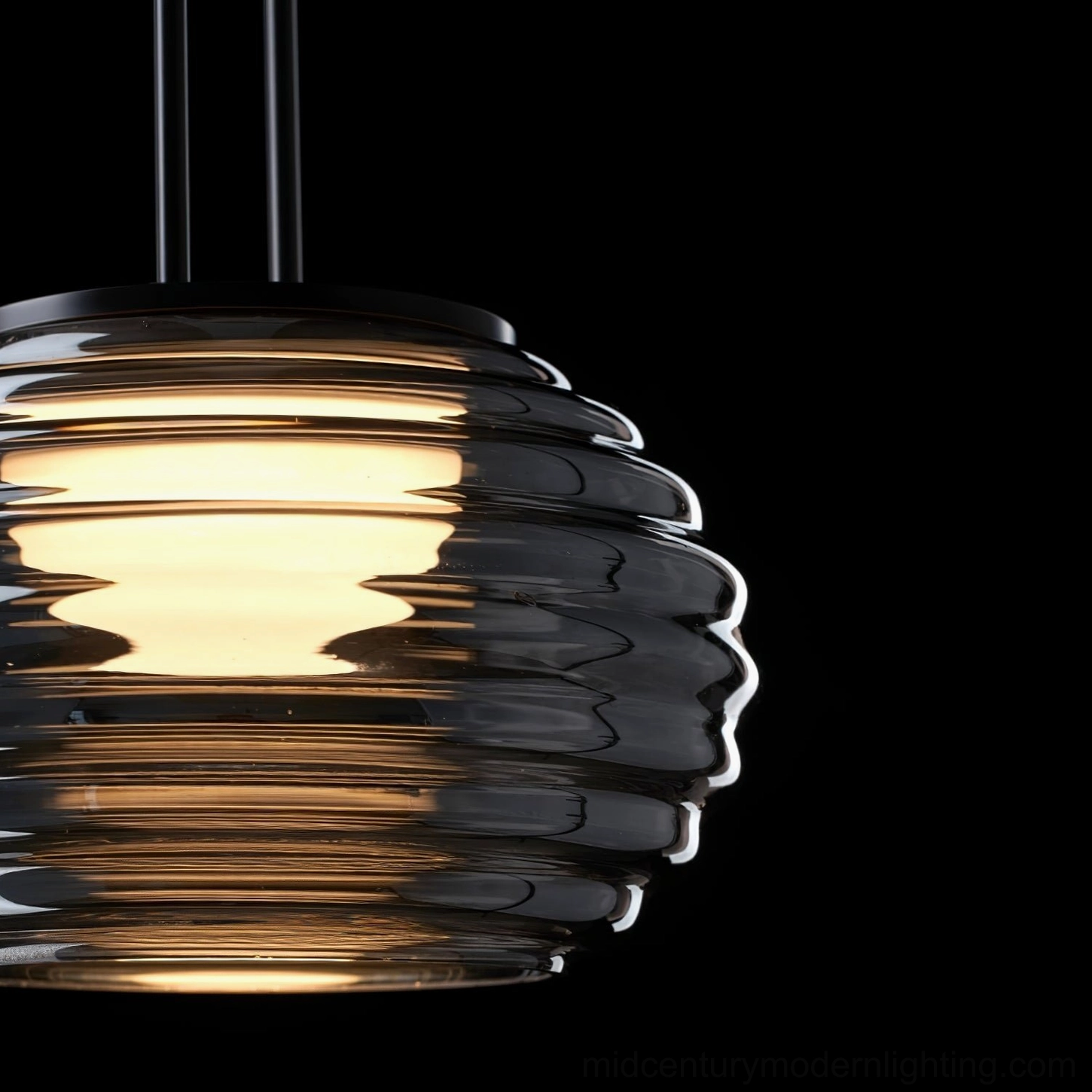 Splugen Venetian pendant glass detail with smoke finish and light transmission characteristics