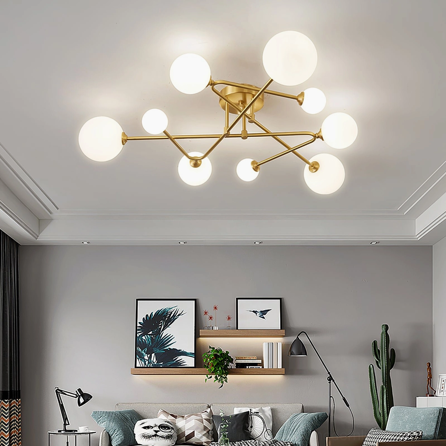 Sputnik ceiling pendant light showing symmetrical globe arrangement and brass construction