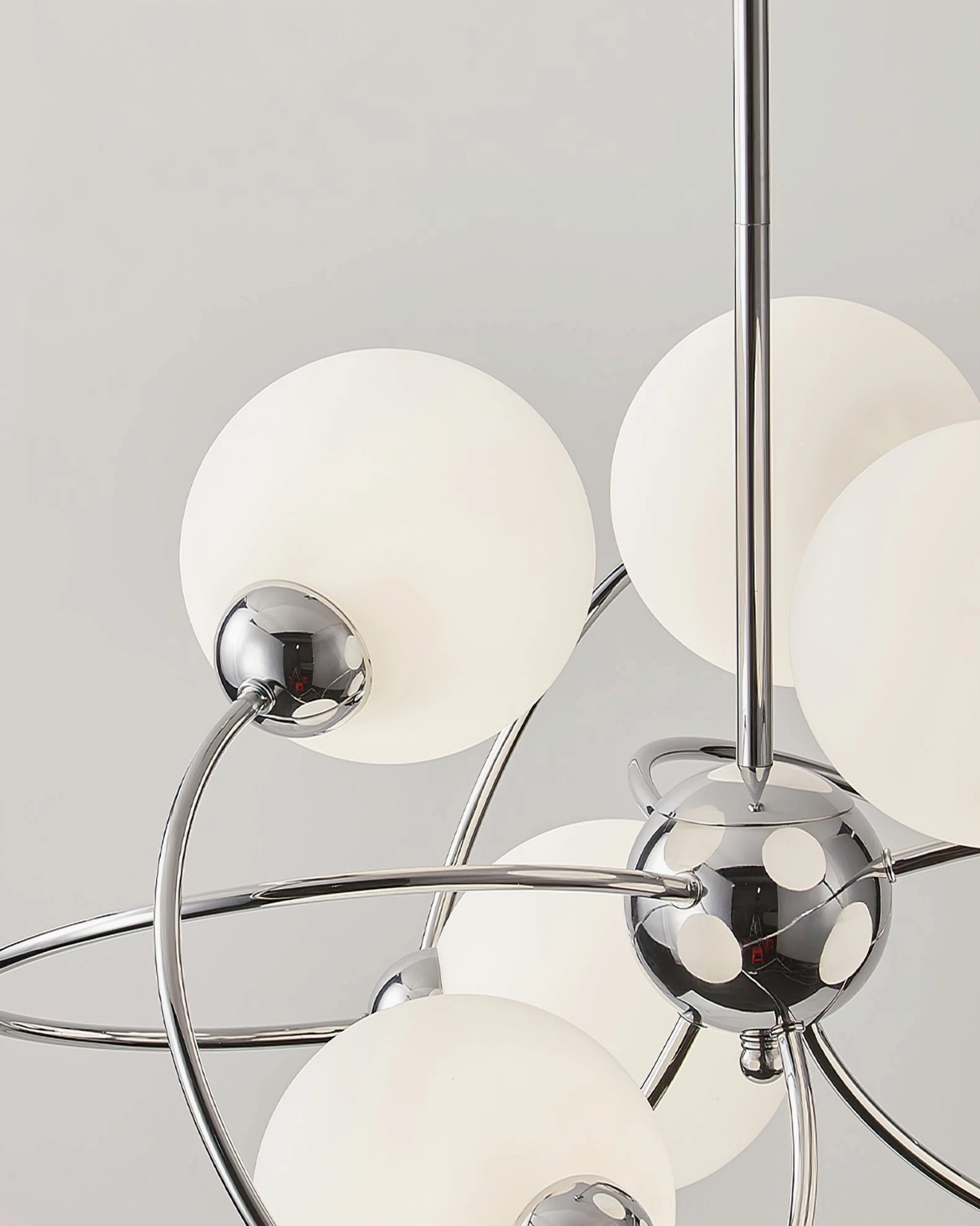Sputnik pendant light frosted globe shade metal frame geometric design detail