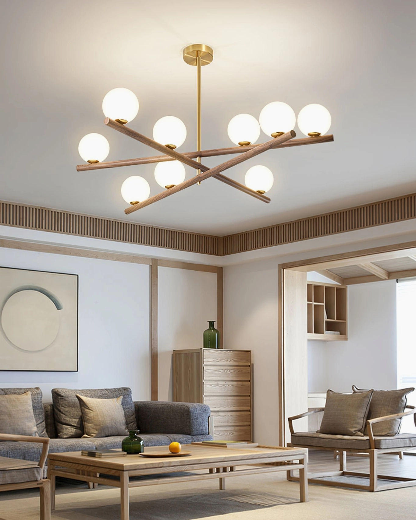 Overhead shot of line ball chandelier showing radial design with frosted opal glass shades arranged symmetrically around gold center