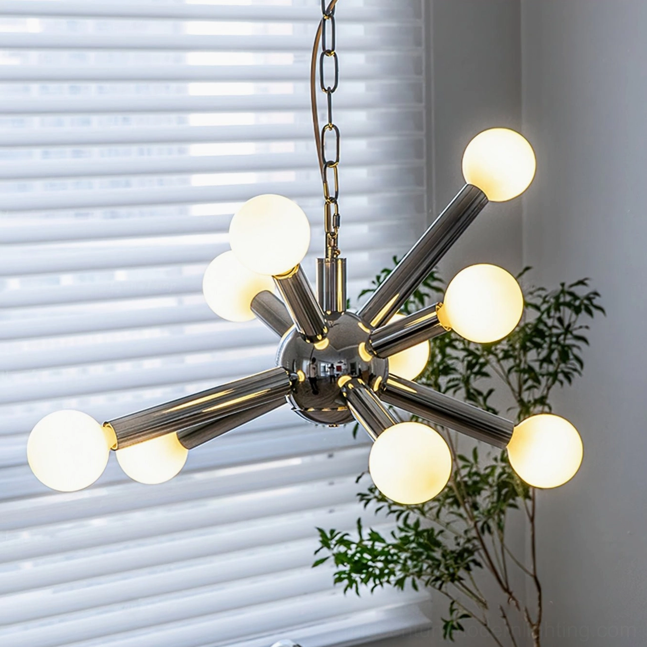 Sputnik chandelier detail, white frosted globe lights with polished chrome arms, nine-light atomic age fixture
