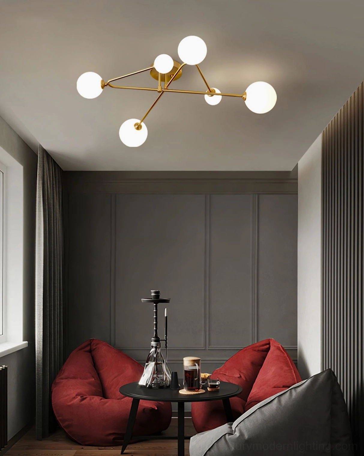 Close-up view of sputnik ceiling light brass arms and frosted white glass shade assembly