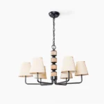 Stacey 6-arm mid-century modern pleated fabric chandelier overhead full front view with black metal frame and fluted wooden central column
