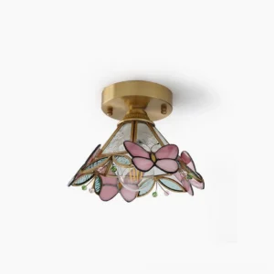 Lulla stained glass butterfly ceiling lamp with brass fixture and pink glass detail, front studio view