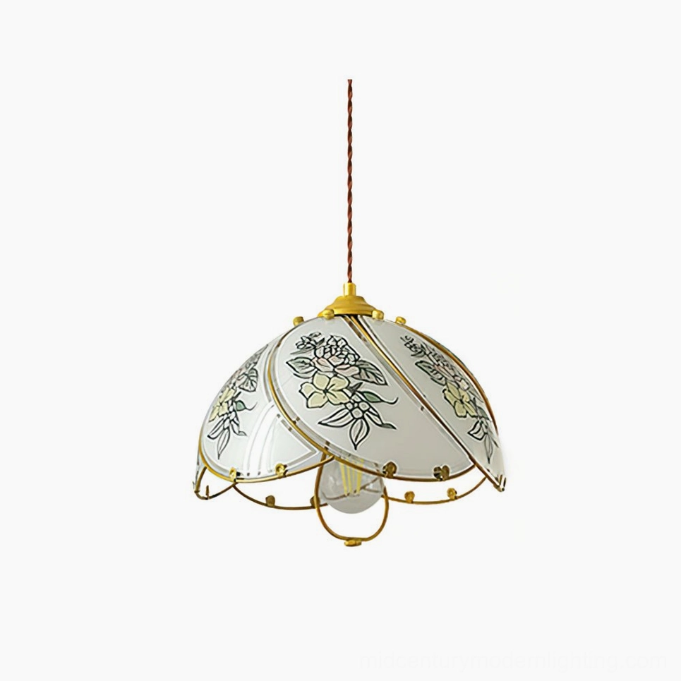Handcrafted stained glass lily pendant lamp with polished brass frame and hand-painted yellow floral motif on frosted glass dome, studio front view