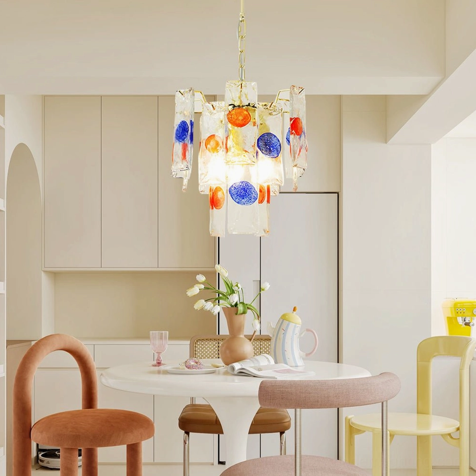 Mid-century modern pendant lamp hanging over white round dining table in contemporary minimalist dining kitchen