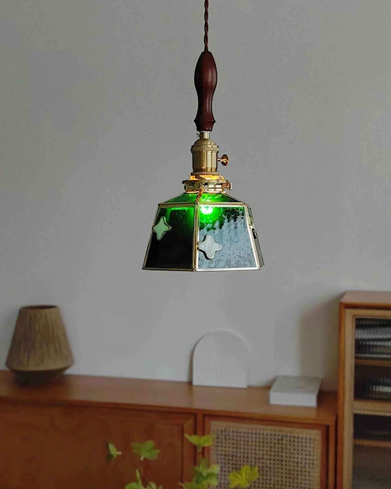 Stained glass pendant lamp with white and red glass combination displayed against neutral background