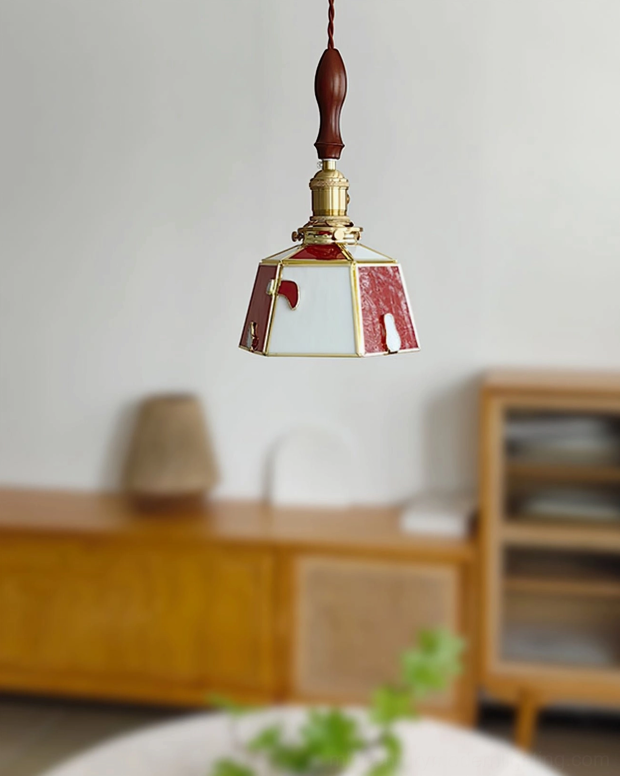 Compact stained glass pendant lamp with reverse red-white color combination in minimalist modern space