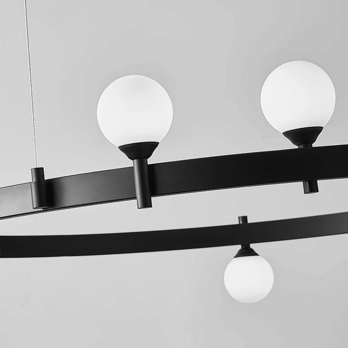 Stant orbital ring chandelier ambient lighting view demonstrating soft diffusion and warm illumination quality