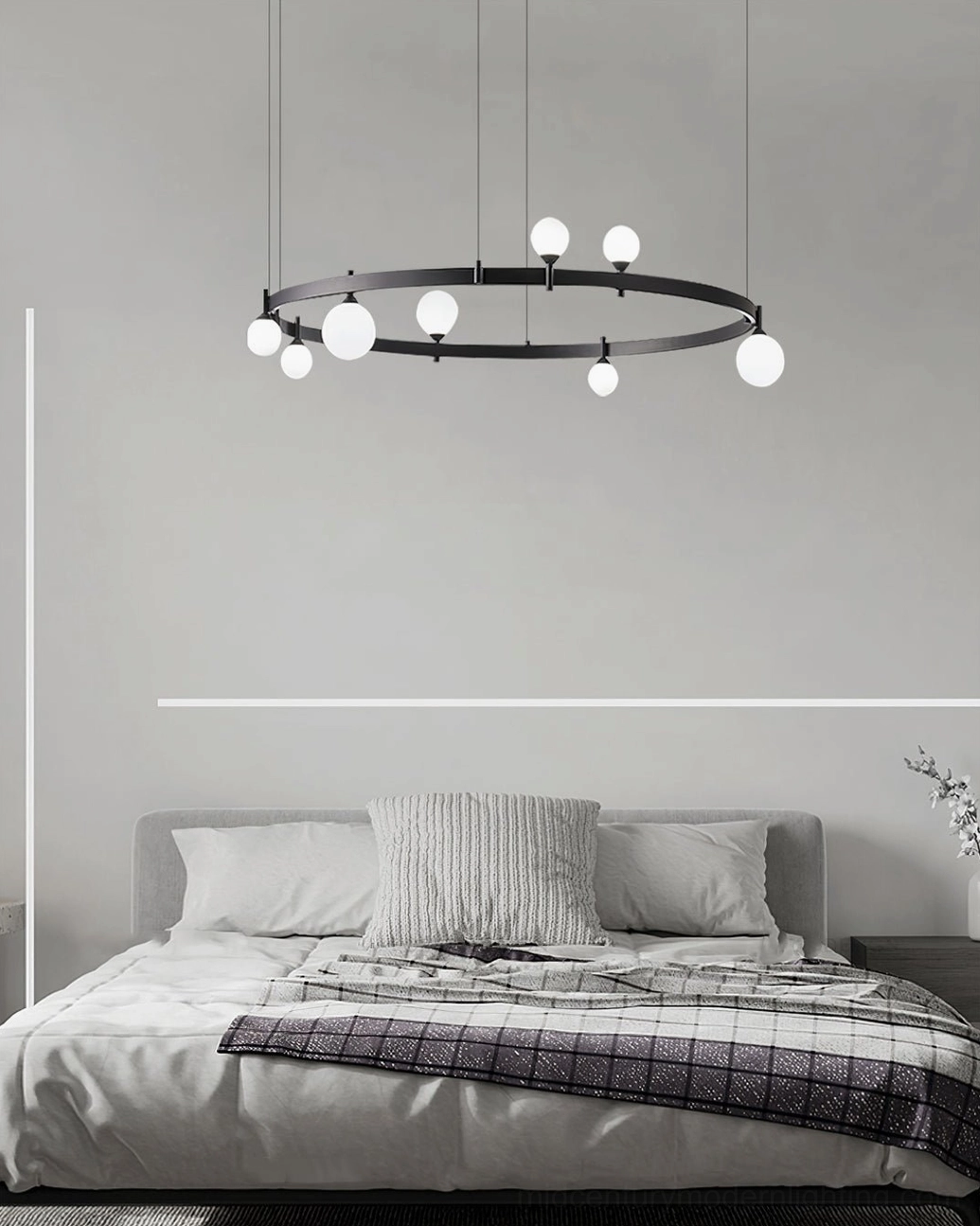 Modern ring-shaped pendant chandelier architectural detail view showing metal frame and suspension mechanism