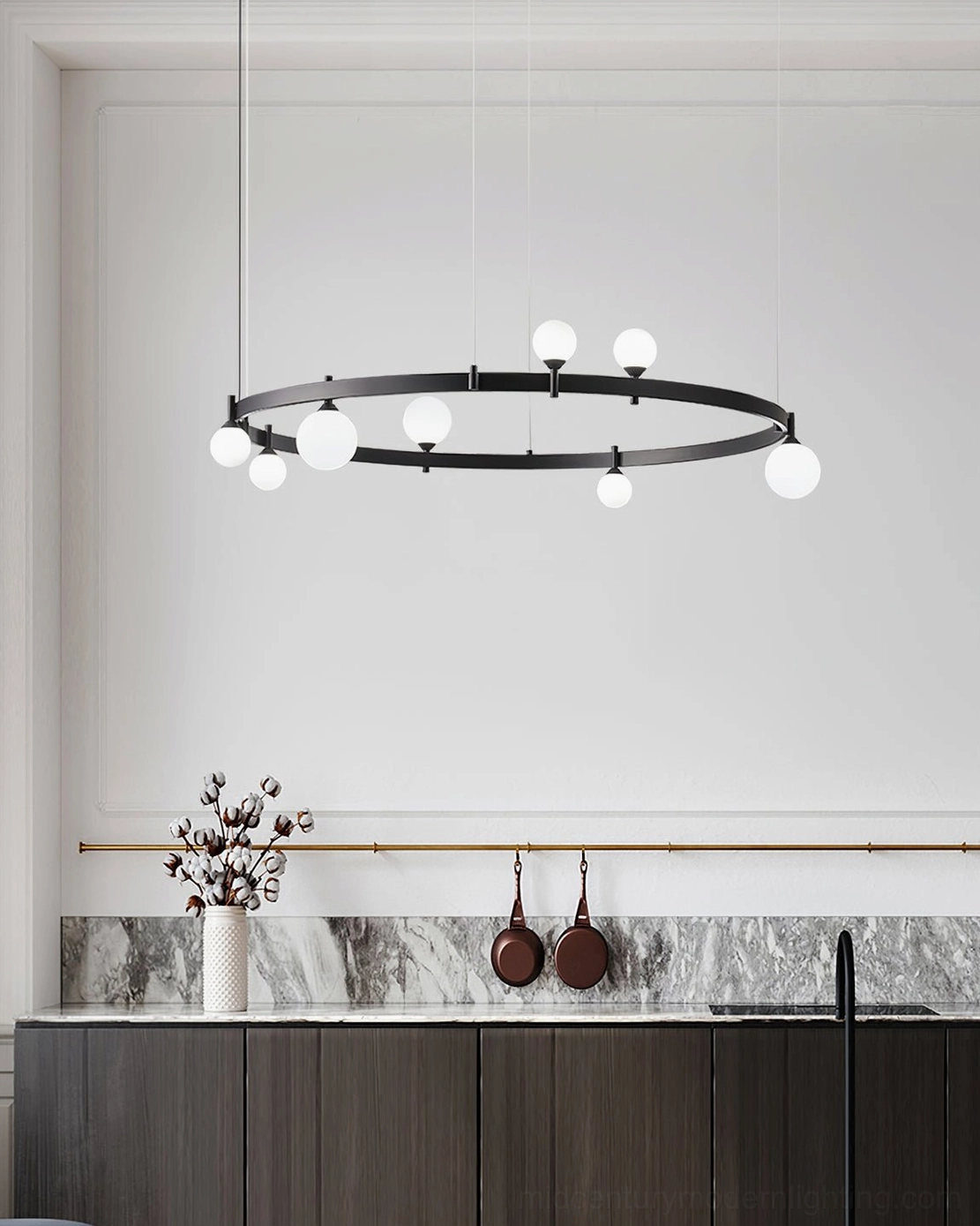 Stant orbital chandelier close-up detail view highlighting frosted glass globes and metal fastening structure