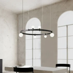 Modern black circular chandelier installed in minimalist dining room with arched windows and mid-century furniture