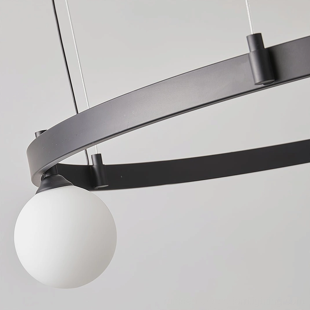 Stant circular orbital pendant light contemporary interior design example with Scandinavian modern furnishings