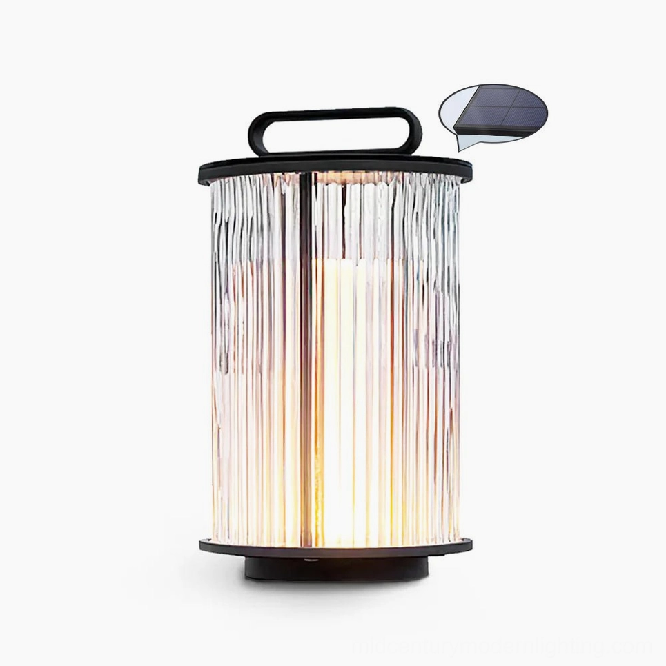 Statement 30cm solar glass lantern table lamp in black and clear with solar warm light output