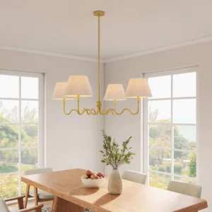 Stella Wave 4-light brass chandelier suspended in farmhouse dining room with beige pleated shades