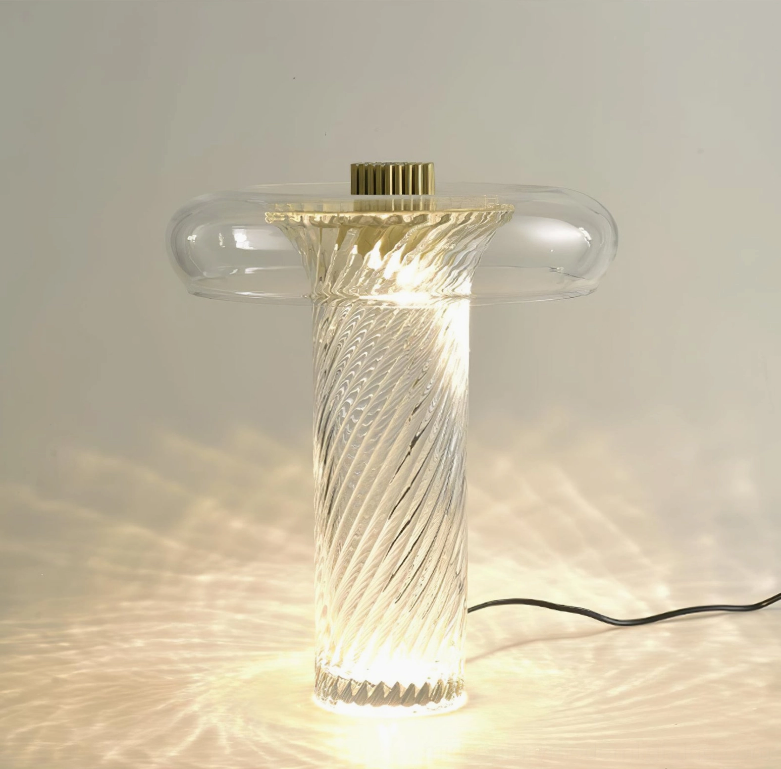 Stellar table lamp mid-century modern style, clear glass with integrated LED light source for contemporary interiors