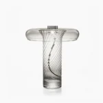 Stellar vintage glass table lamp with integrated LED, featuring ribbed glass body and brass hardware, front view on minimalist white surface