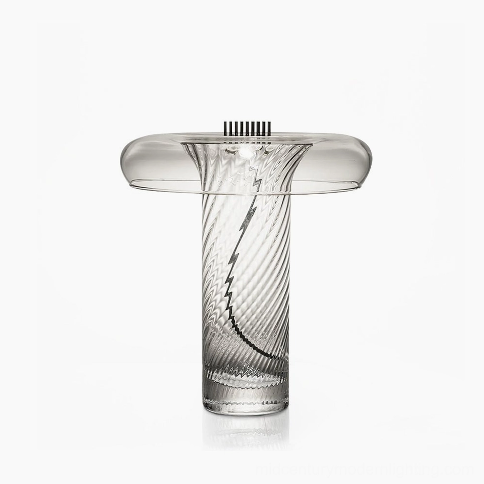 Stellar vintage glass table lamp with integrated LED, featuring ribbed glass body and brass hardware, front view on minimalist white surface