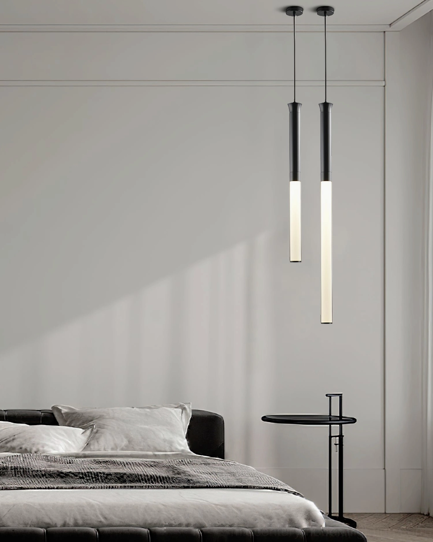 Modern kitchen island with Stick LED pendant lights providing task lighting and contemporary aesthetic