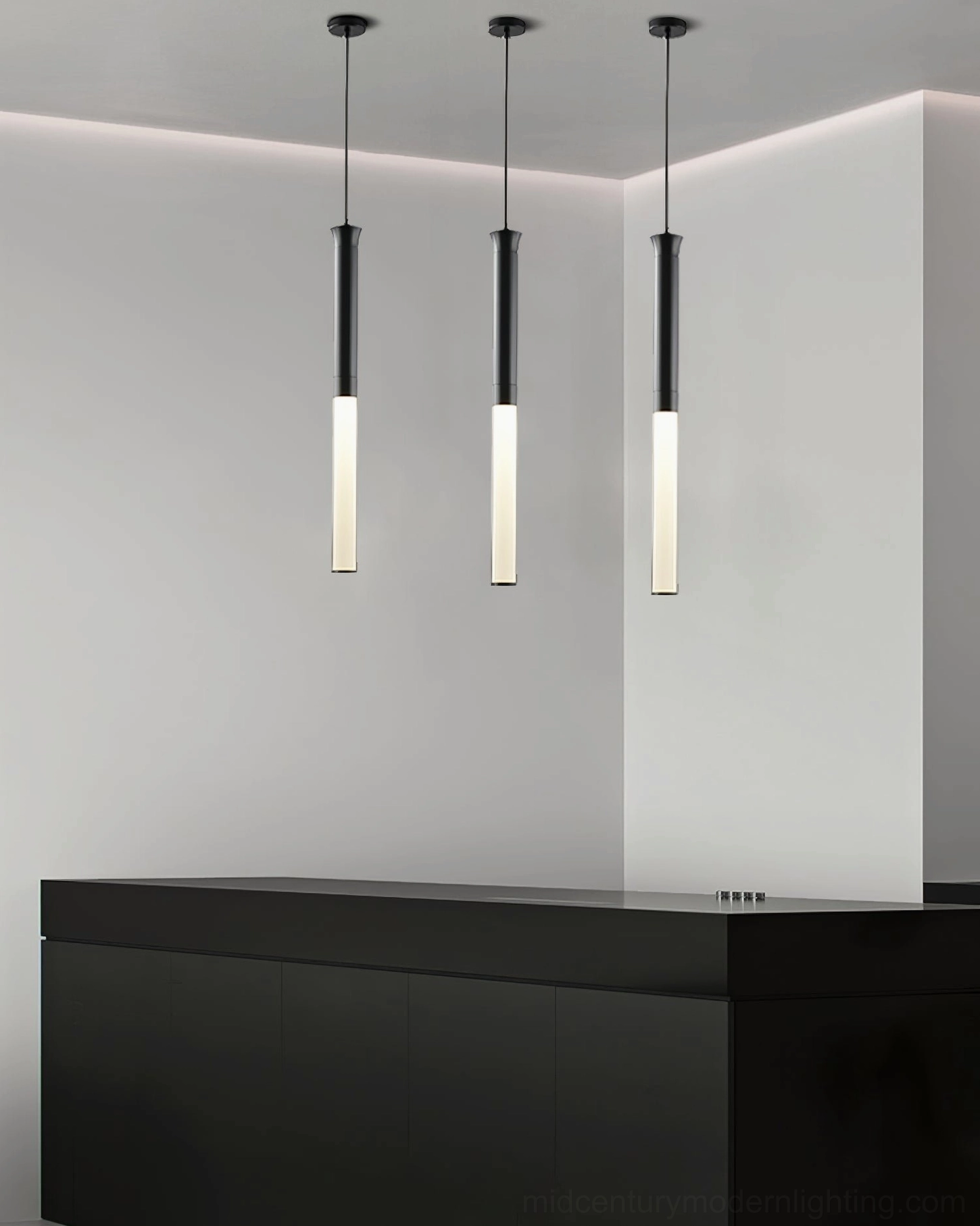 Three Stick LED pendant lights aligned in corner of modern commercial space with black counter