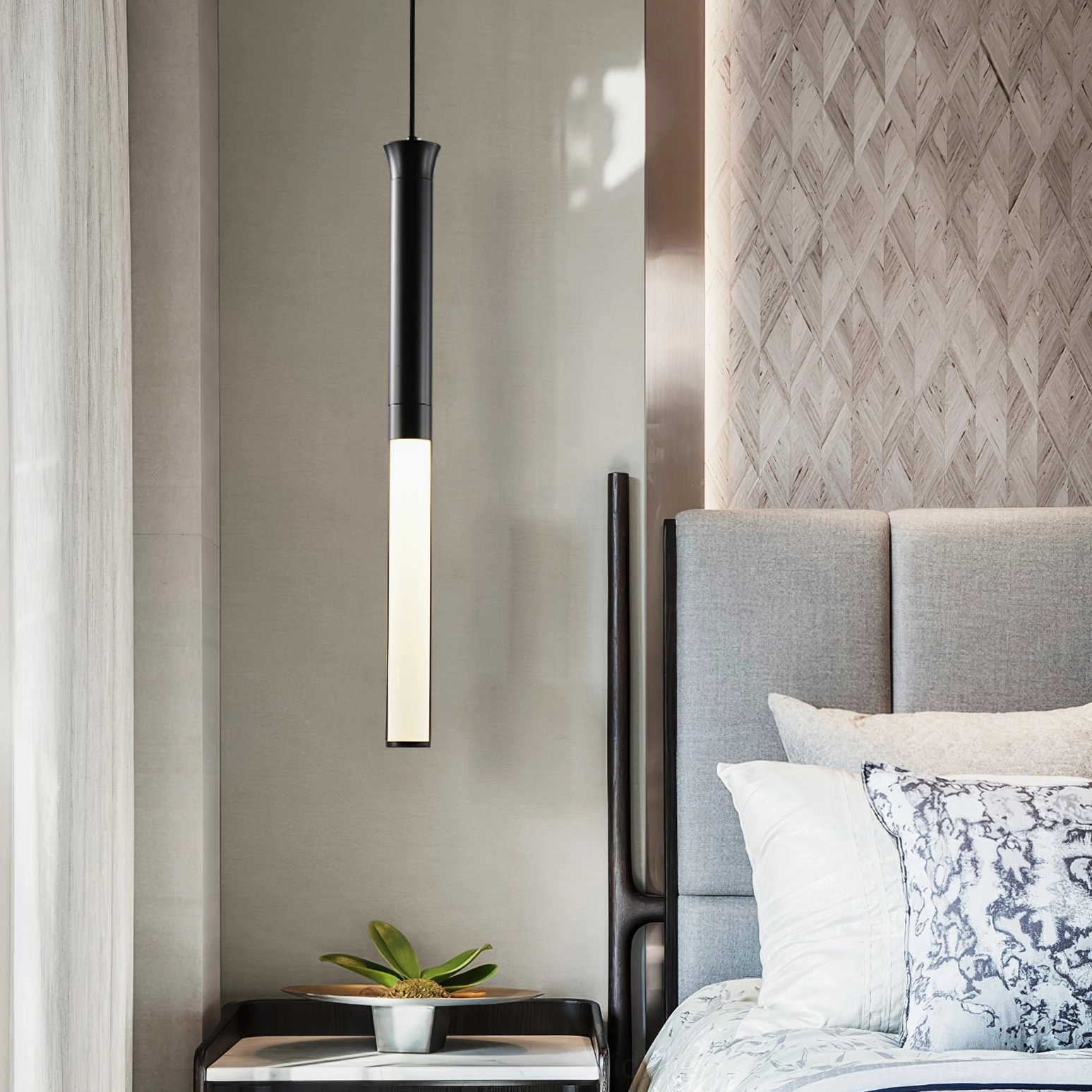 Stick LED pendant light with frosted white acrylic diffuser and matte black finish detail view