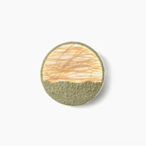 Natural straw woven wall lamp with light green accents - front view on white background showcasing organic texture and minimalist design