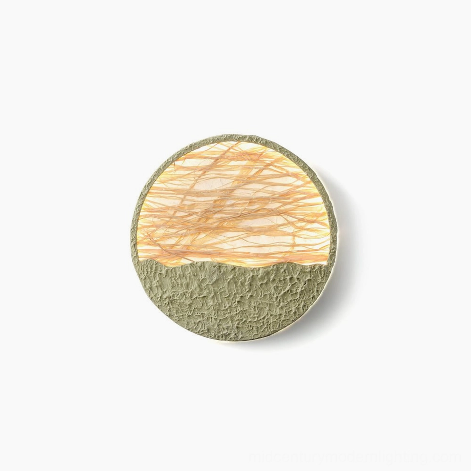 Natural straw woven wall lamp with light green accents - front view on white background showcasing organic texture and minimalist design